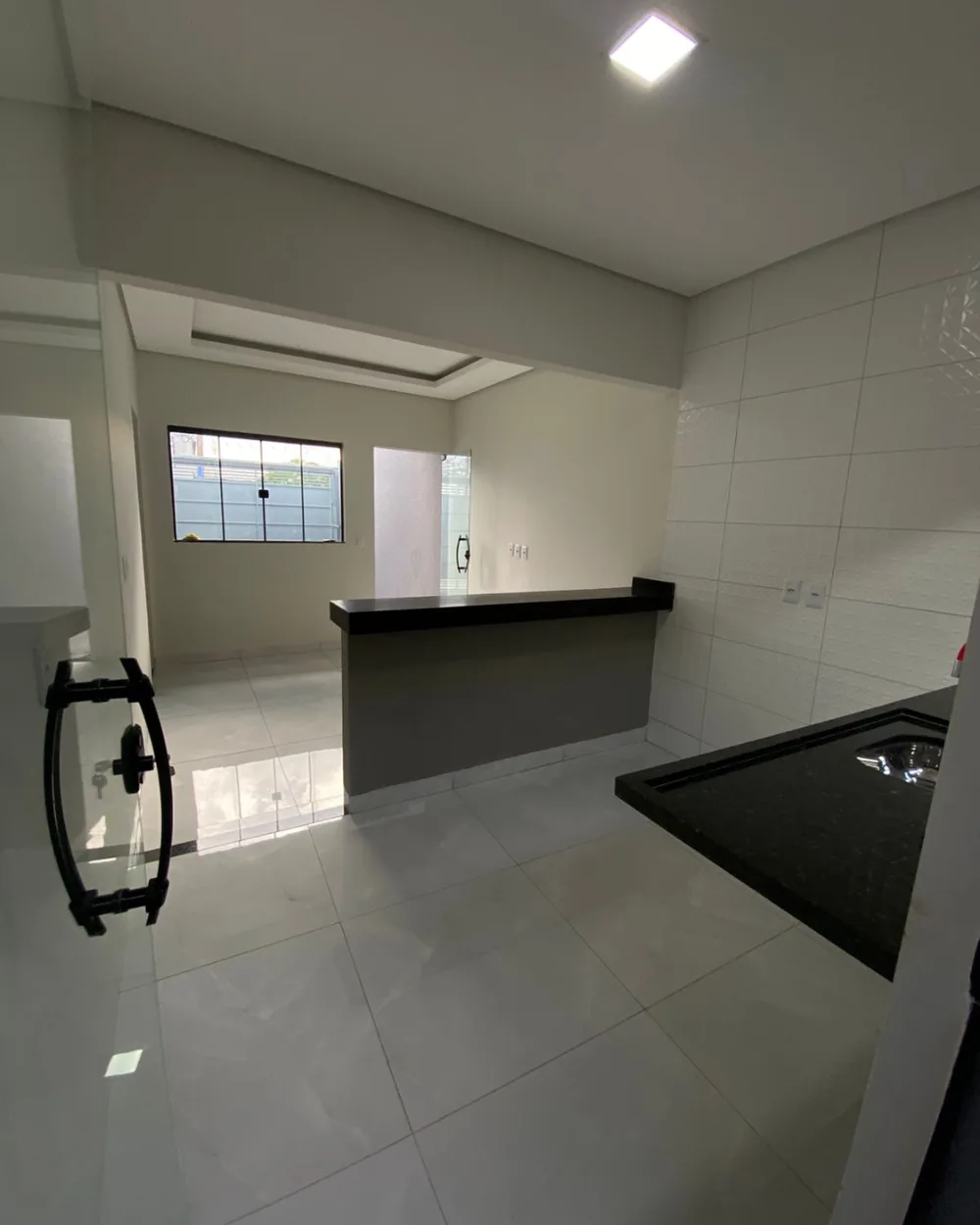Bancada ligando cozinha e sala